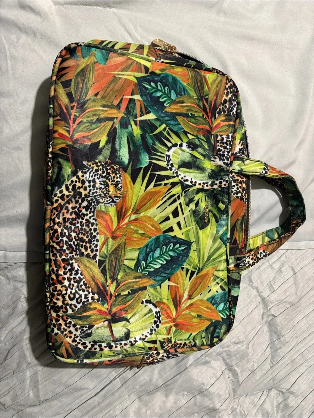 bebe Tropical Leaf & Animal Print lunch bag in Green, Black, Orange.
